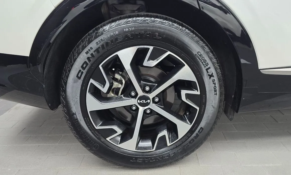 Kia Sportage — фото 9