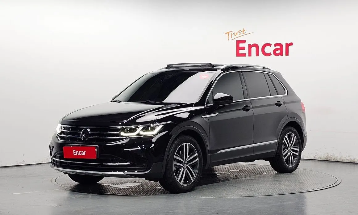 Volkswagen Tiguan — фото 1