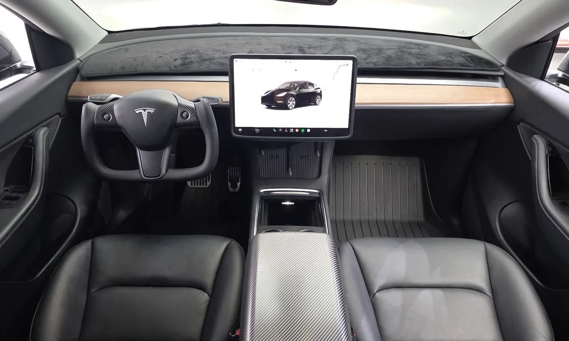 Tesla Model Y — фото 10