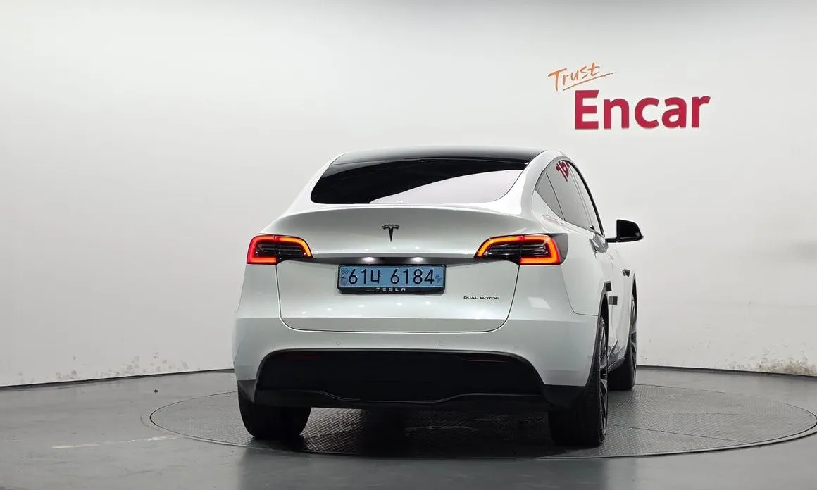 Tesla Model Y — фото 8
