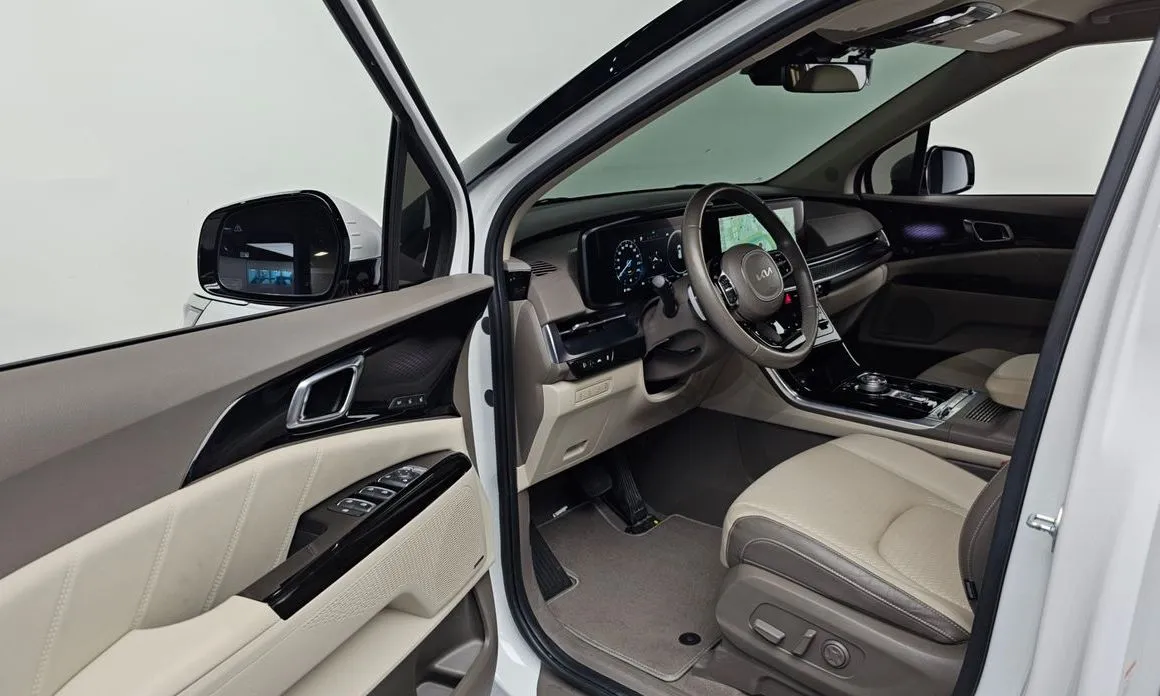 Kia Carnival — фото 10