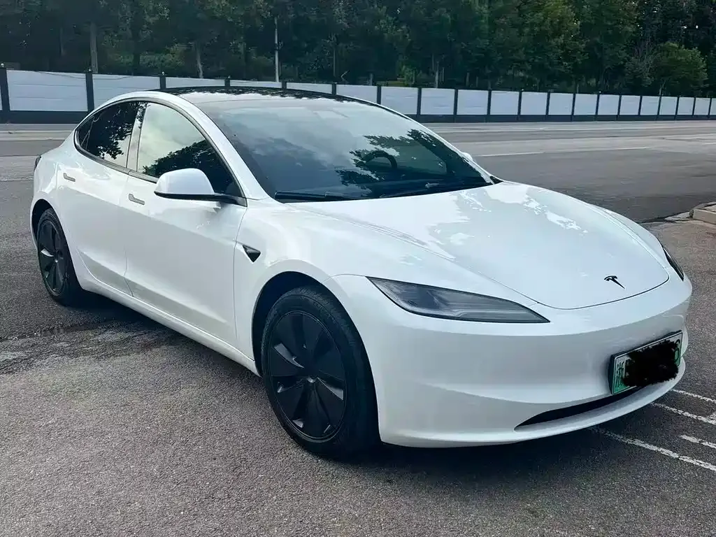 Tesla Model 3 — фото 7