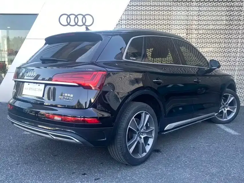 Audi Q5L — фото 5