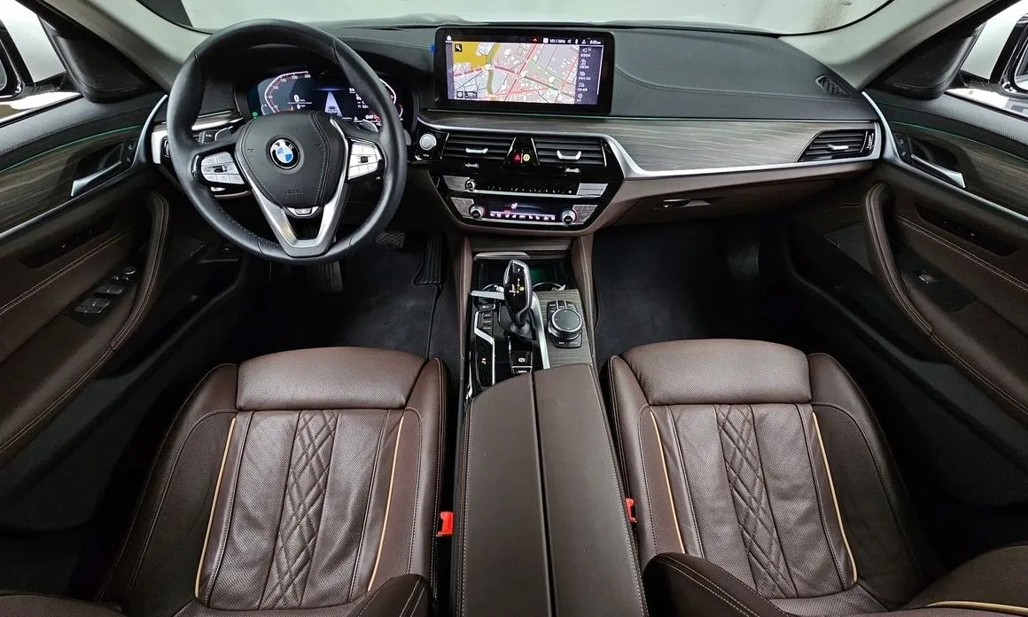 BMW 5-Series — фото 10
