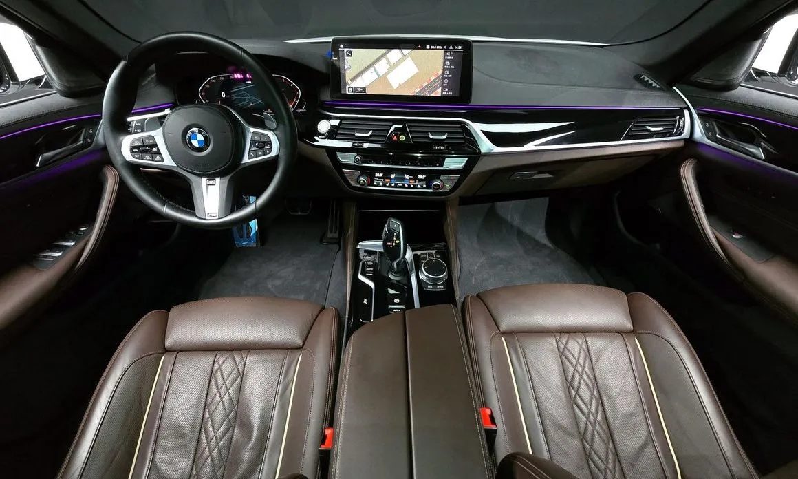 BMW 5-Series — фото 10