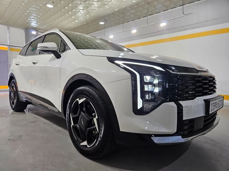 Kia Sportage — фото 8