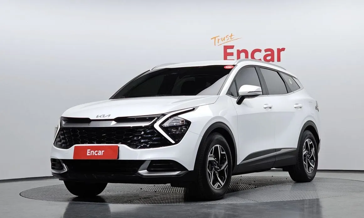 Kia Sportage — фото 1