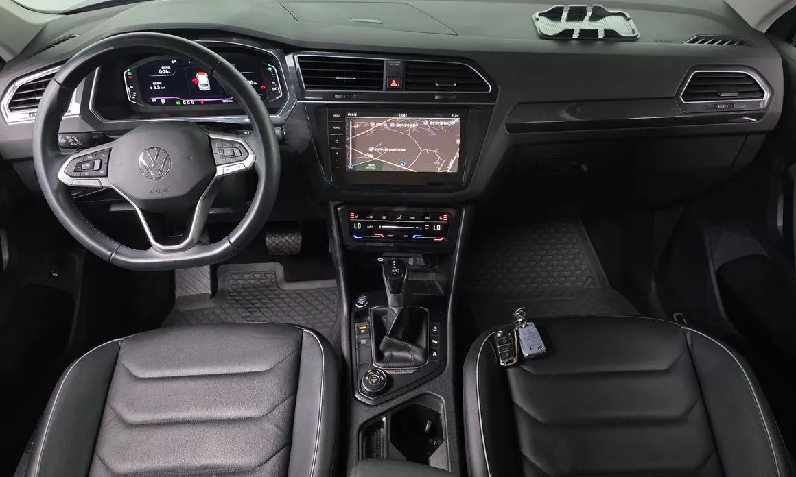 Volkswagen Tiguan — фото 9