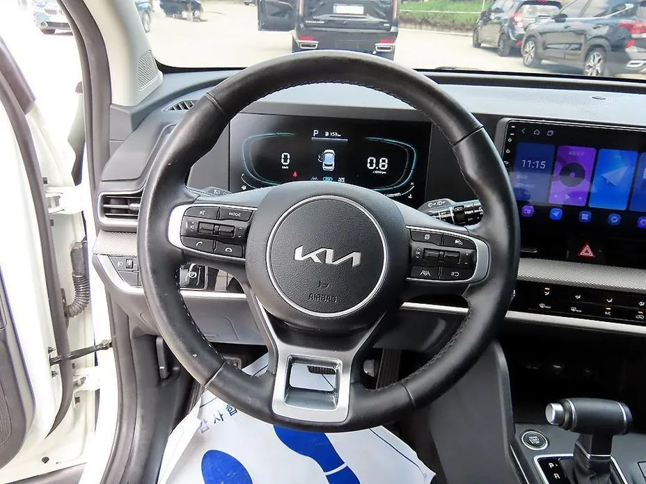 Kia Sportage — фото 10