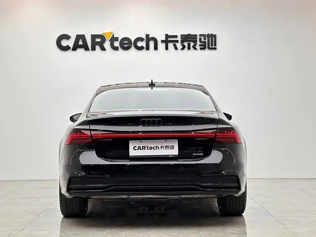 Audi A7L — фото 8