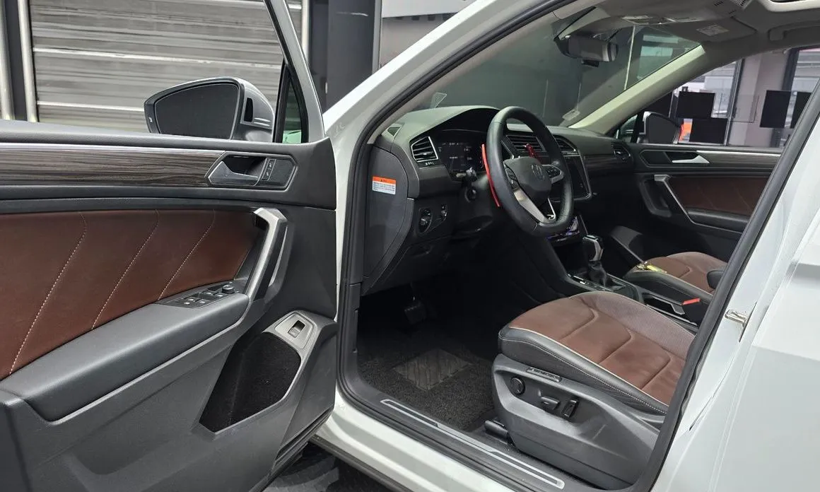 Volkswagen Tiguan — фото 7