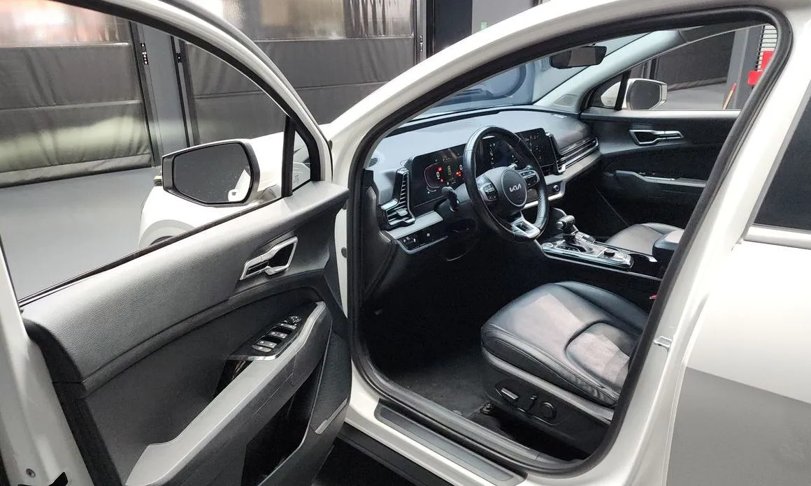 Kia Sportage — фото 10
