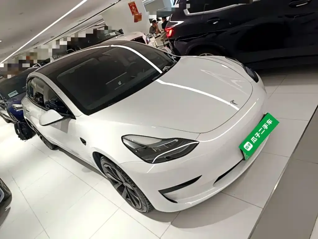Tesla Model 3 — фото 10