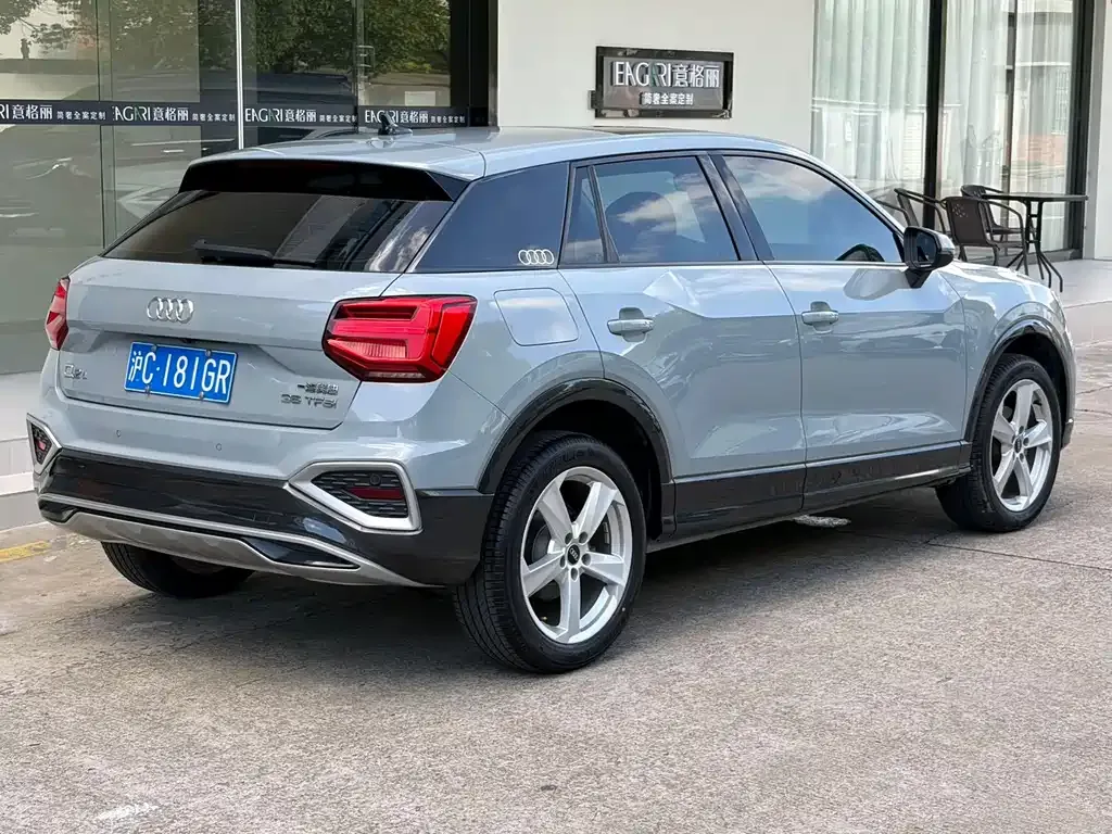 Audi Q2L — фото 8