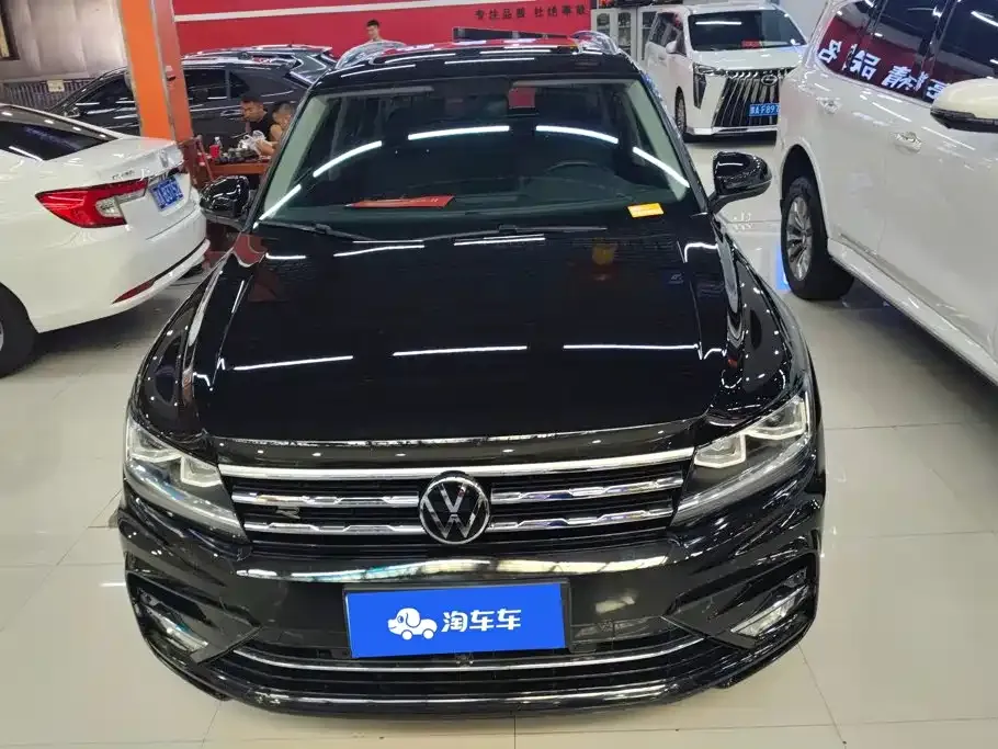 Volkswagen Tiguan L — фото 10