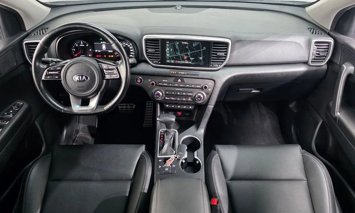 Kia Sportage — фото 8