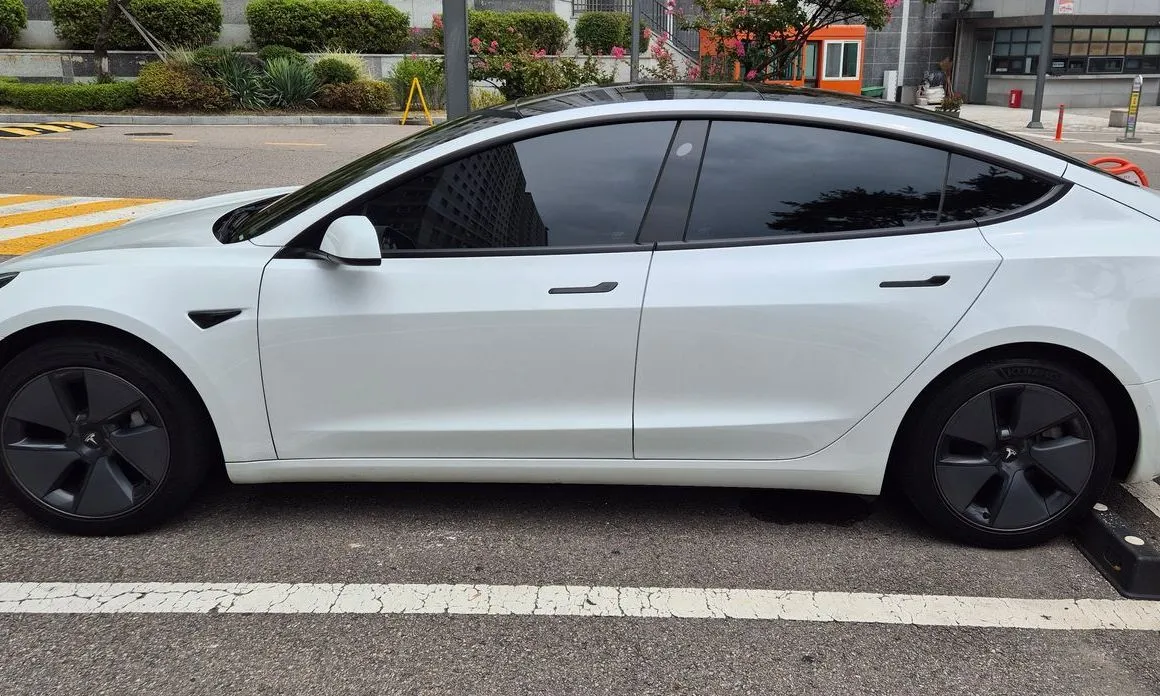 Tesla Model 3 — фото 10