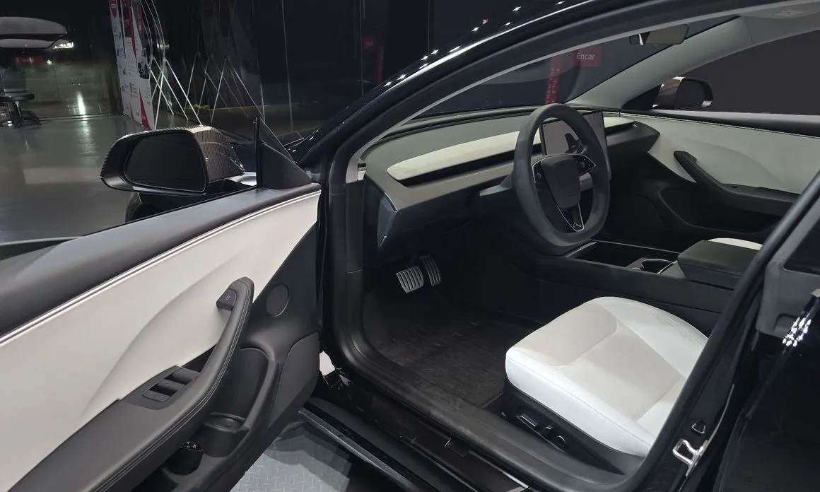 Tesla Model 3 — фото 10