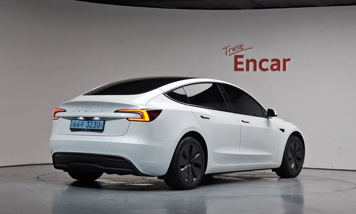 Tesla Model 3 — фото 7