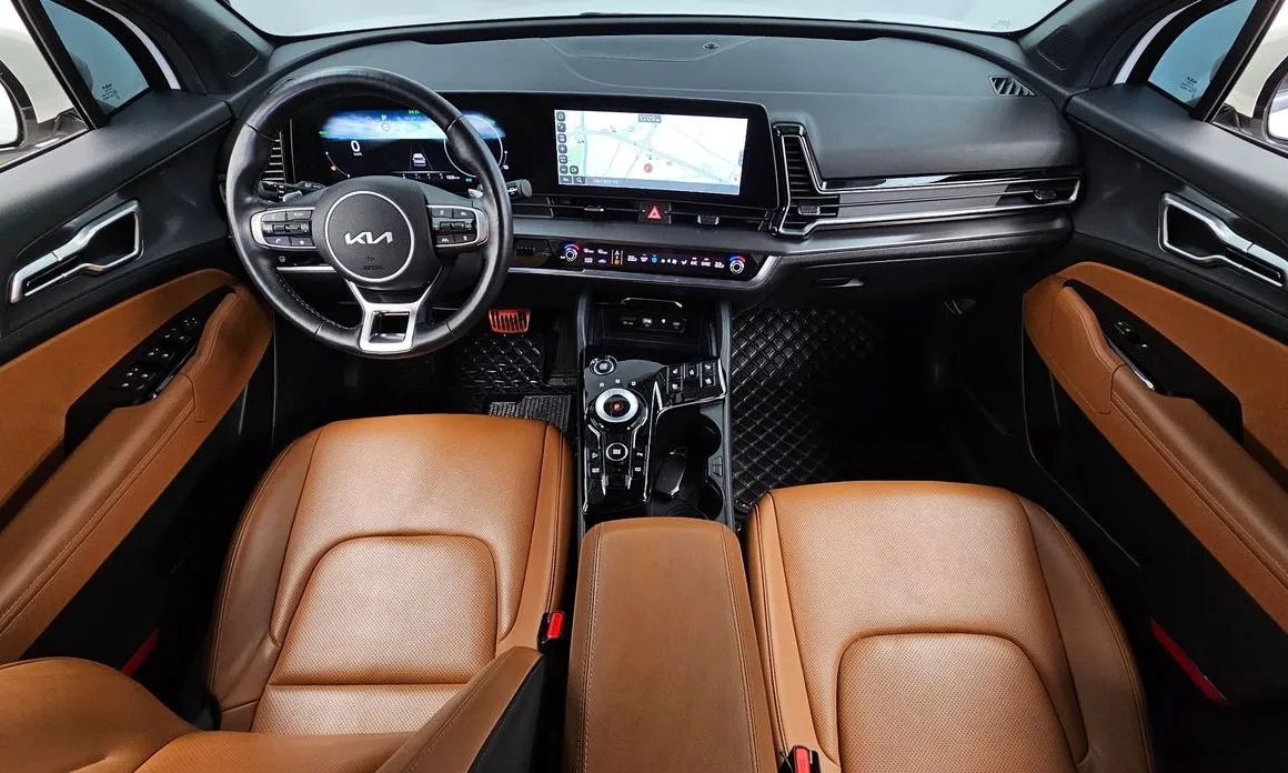Kia Sportage — фото 10