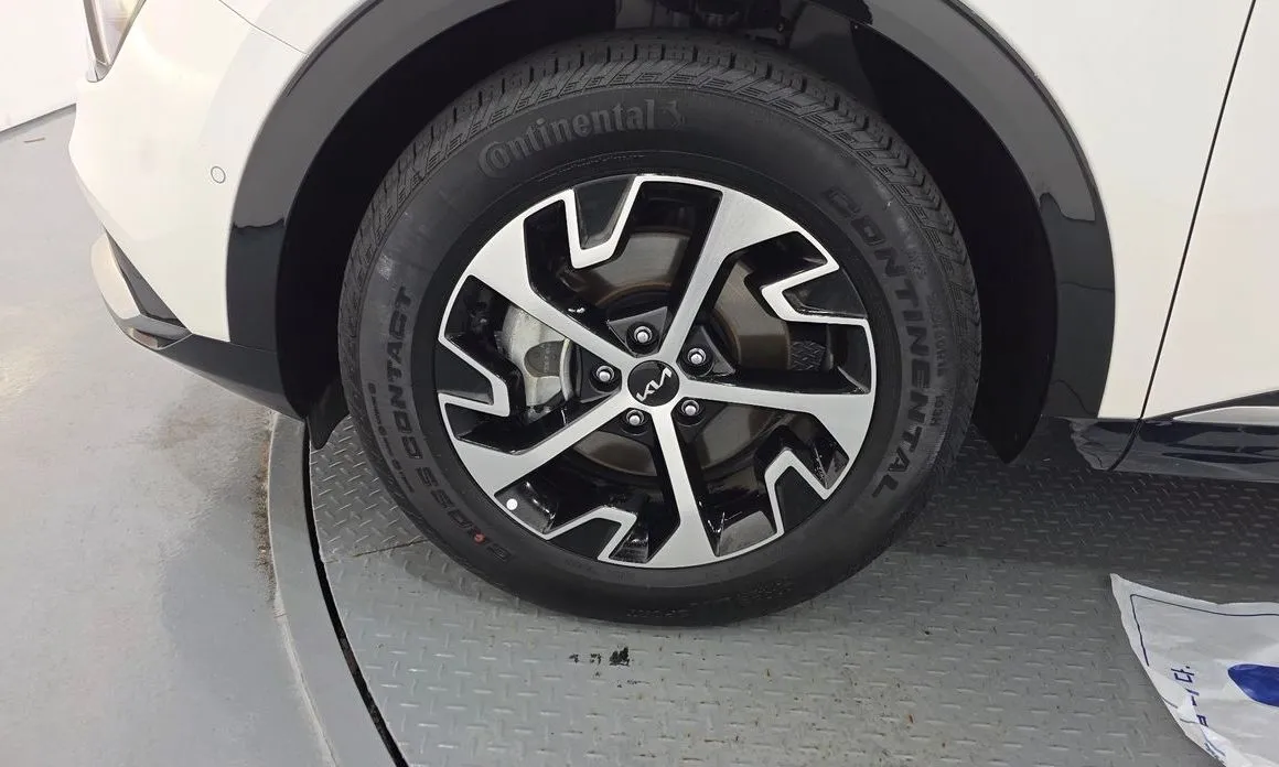 Kia Sportage — фото 10
