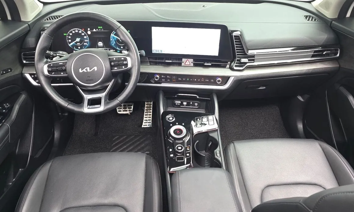 Kia Sportage — фото 8