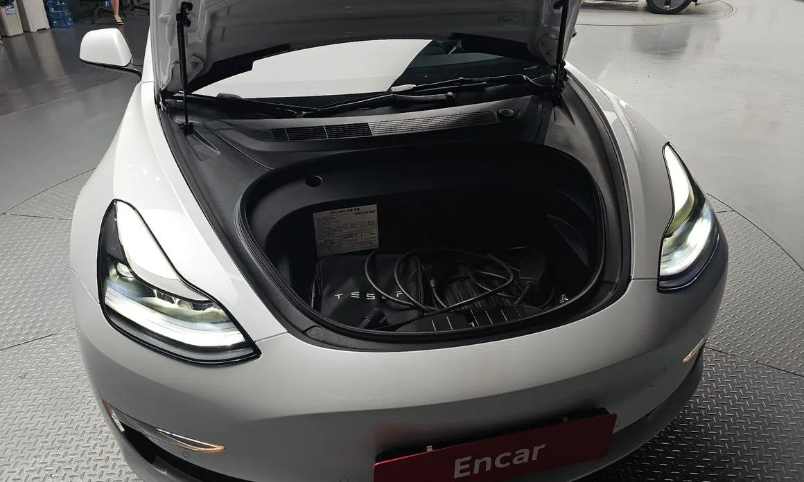 Tesla Model 3 — фото 10