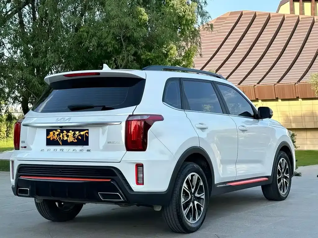 Kia Sportage — фото 9