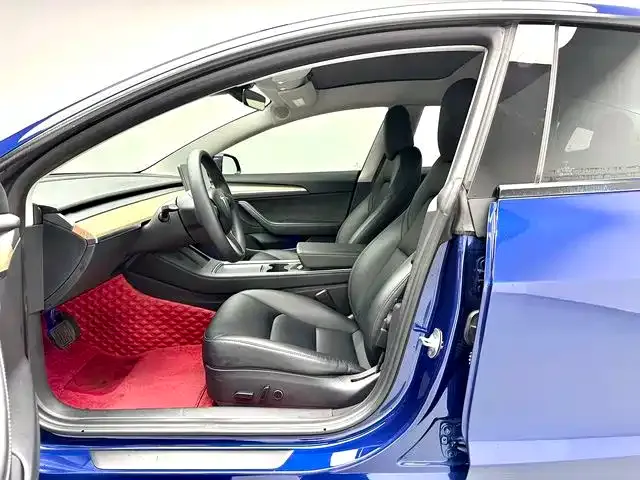 Tesla Model 3 — фото 10