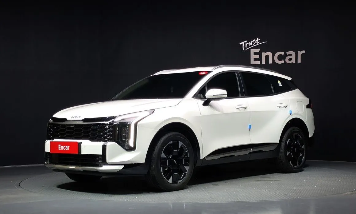 Kia Sportage — фото 1