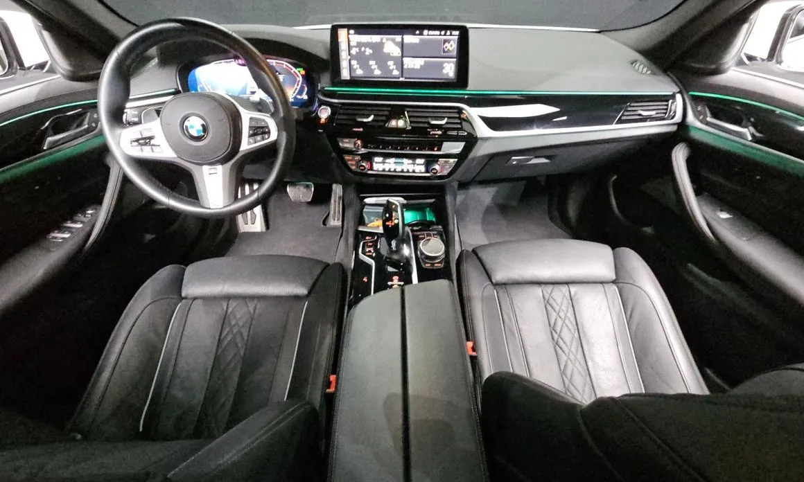 BMW 5-Series — фото 5