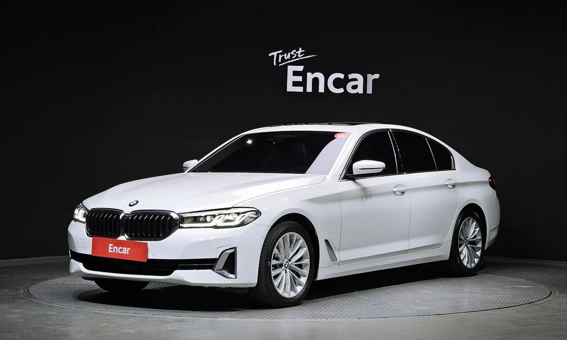 BMW 5-Series — фото 1