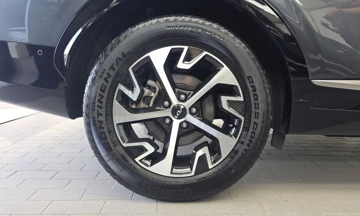 Kia Sportage — фото 7