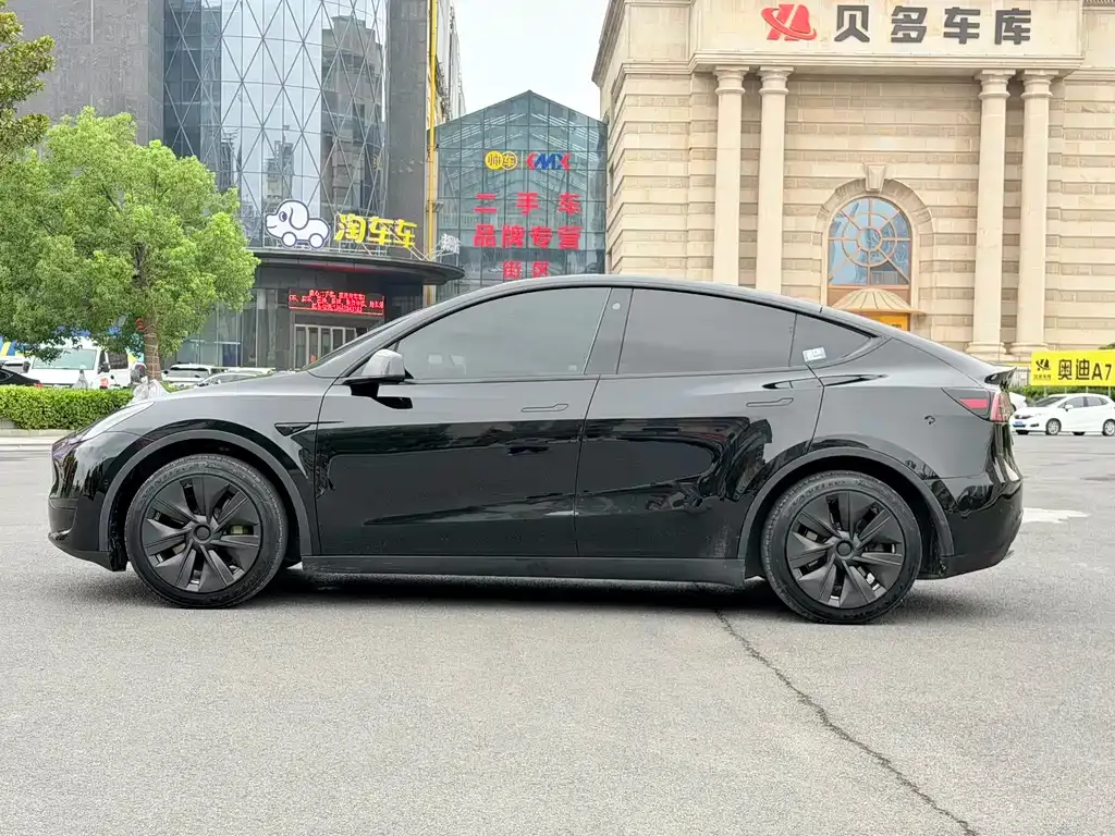Tesla Model Y — фото 7