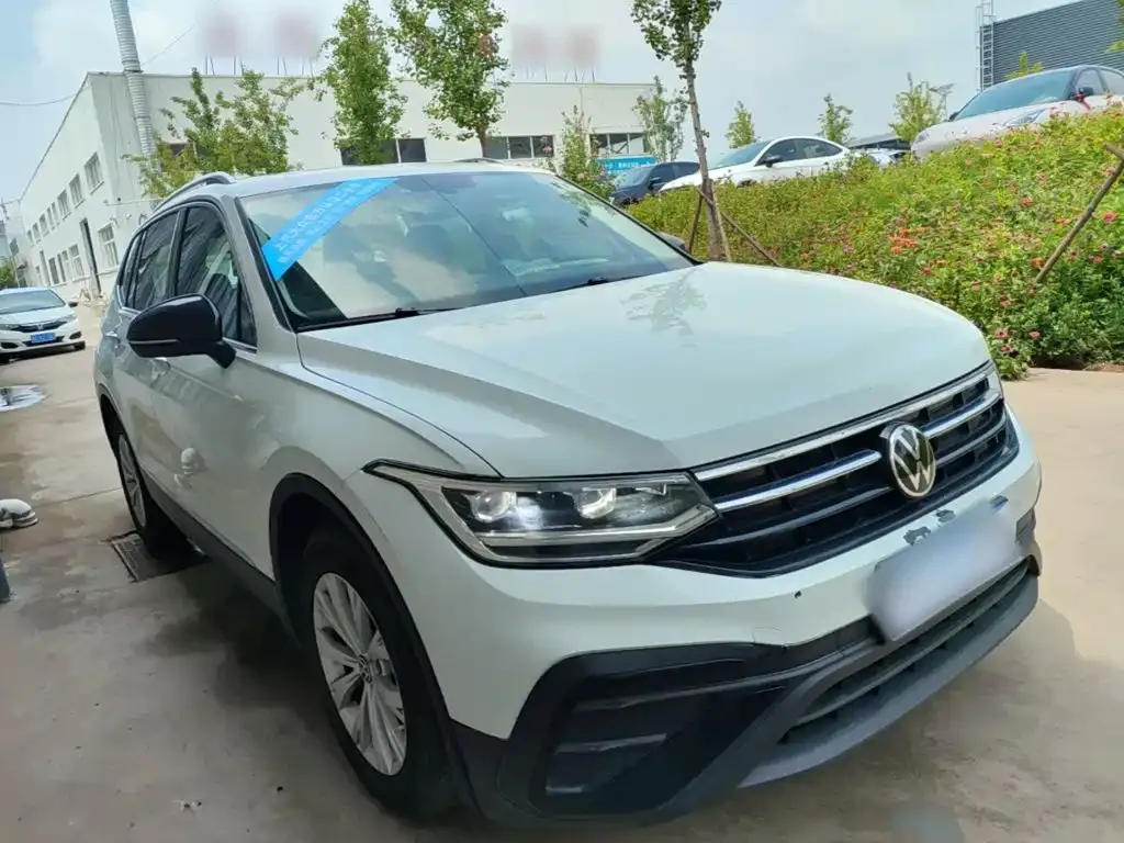 Volkswagen Tiguan L — фото 7