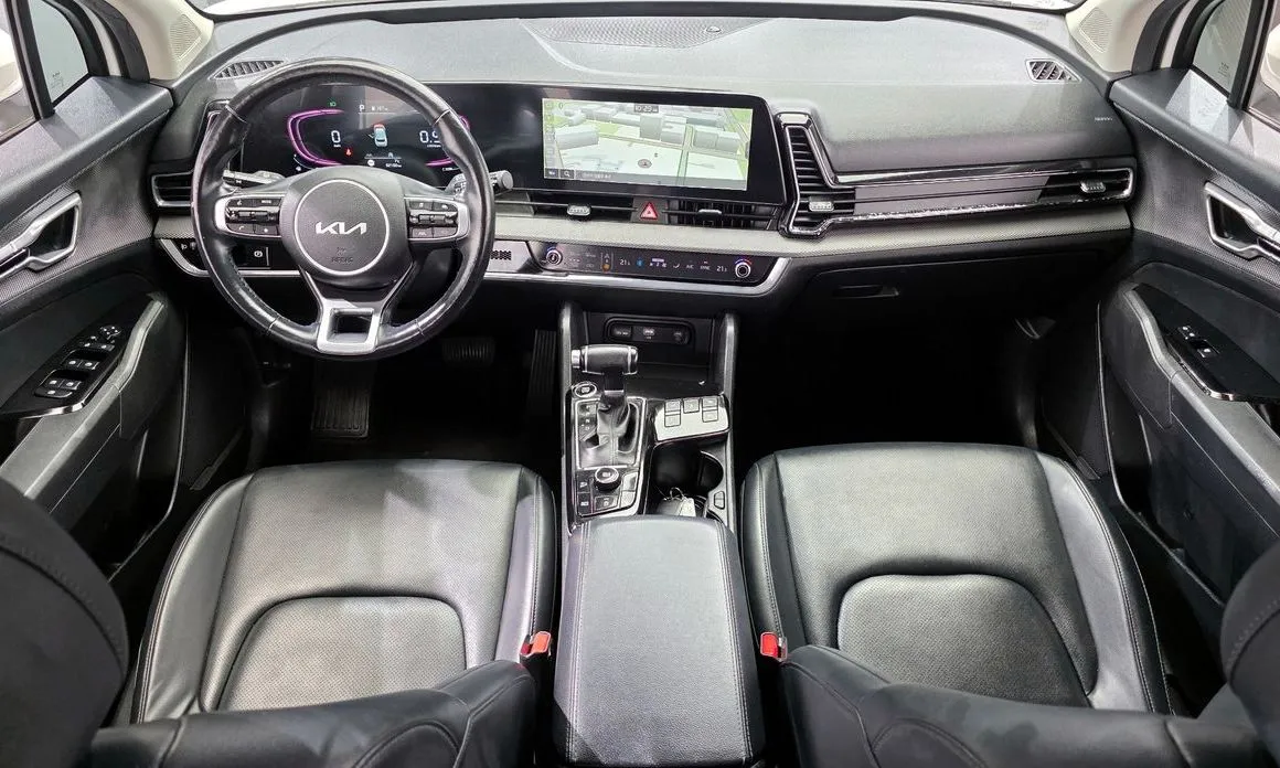 Kia Sportage — фото 8