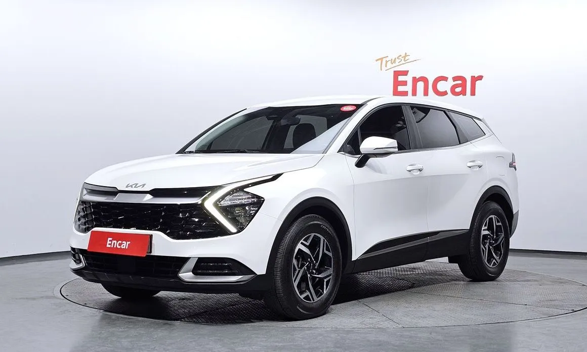 Kia Sportage — фото 1