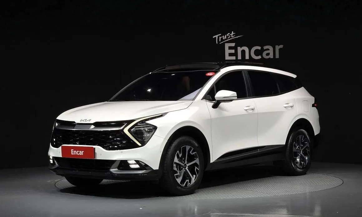 Kia Sportage — фото 1