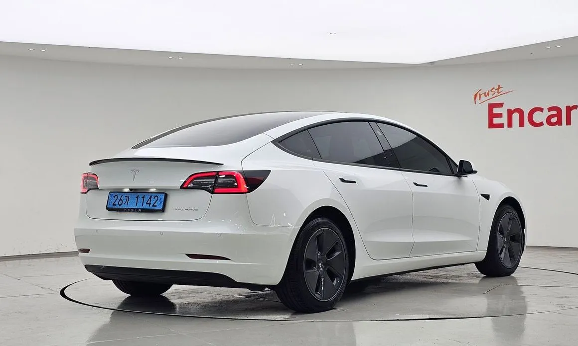 Tesla Model 3 — фото 5
