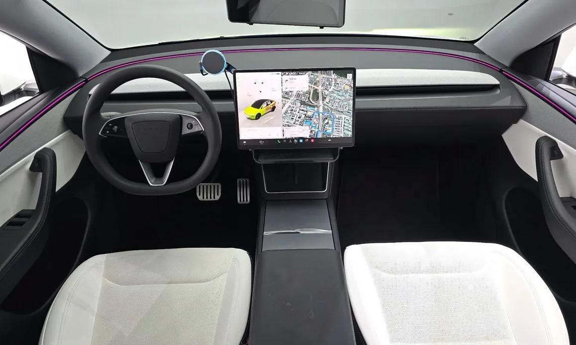 Tesla Model Y — фото 10