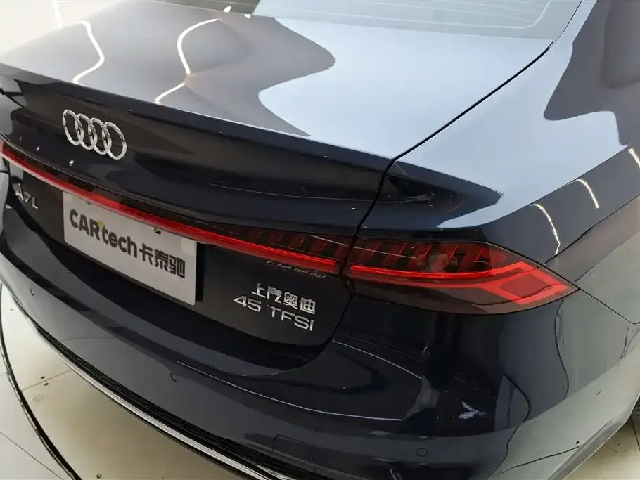 Audi A7L — фото 9