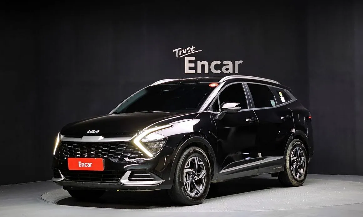 Kia Sportage — фото 1