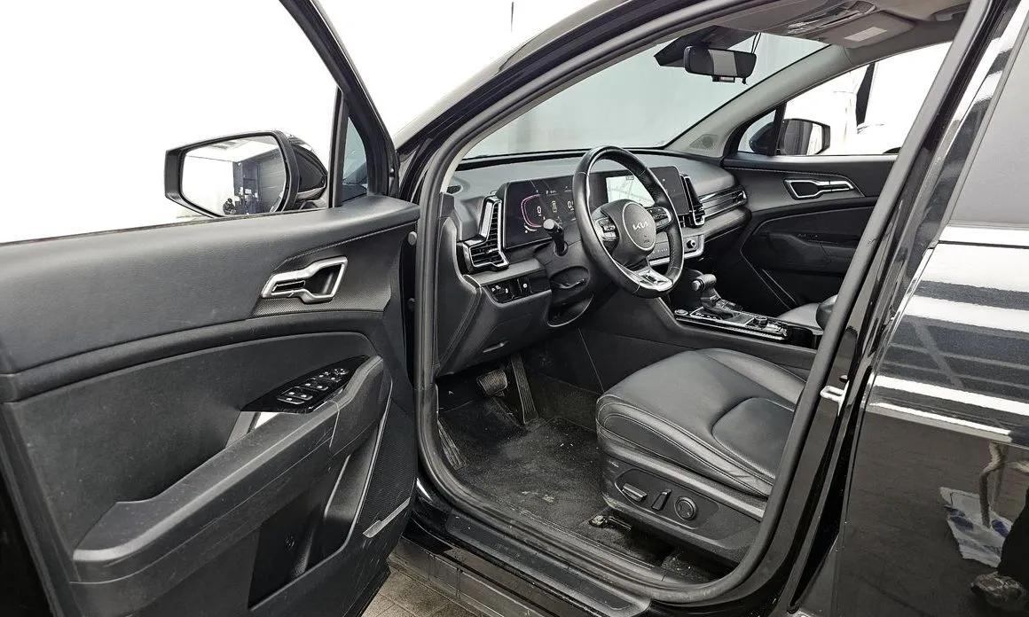 Kia Sportage — фото 7