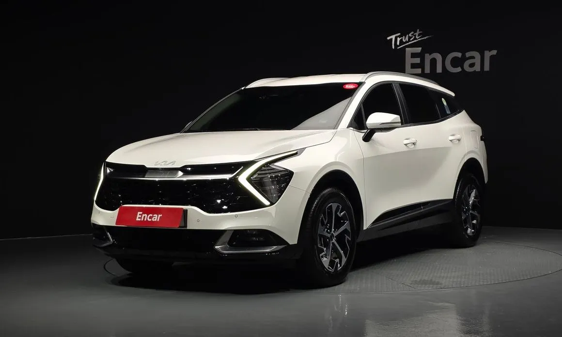 Kia Sportage — фото 1