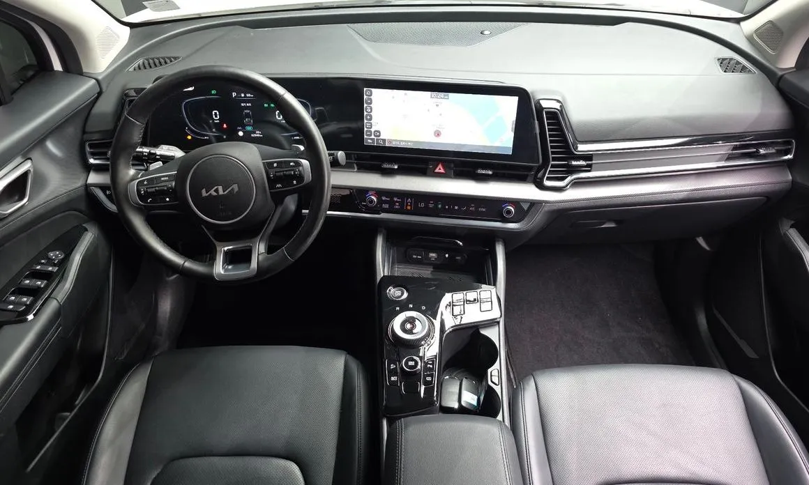 Kia Sportage — фото 10
