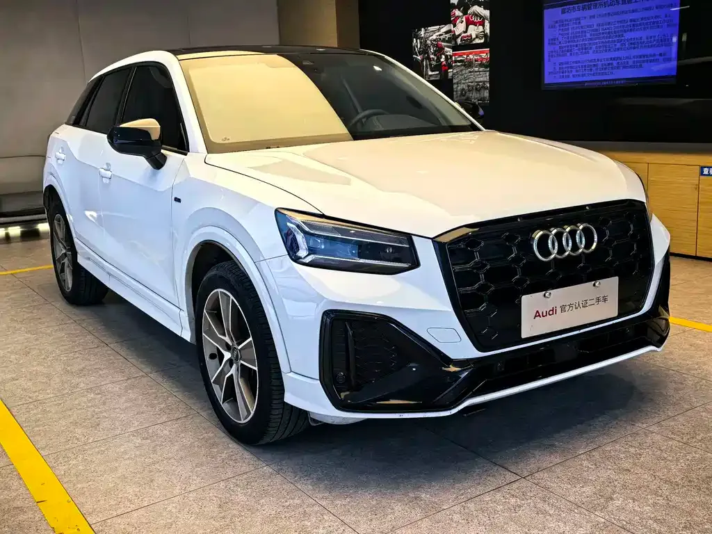 Audi Q2L — фото 7