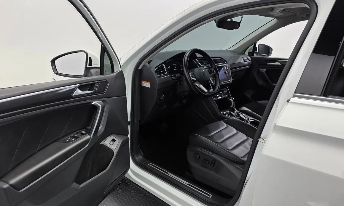 Volkswagen Tiguan — фото 7