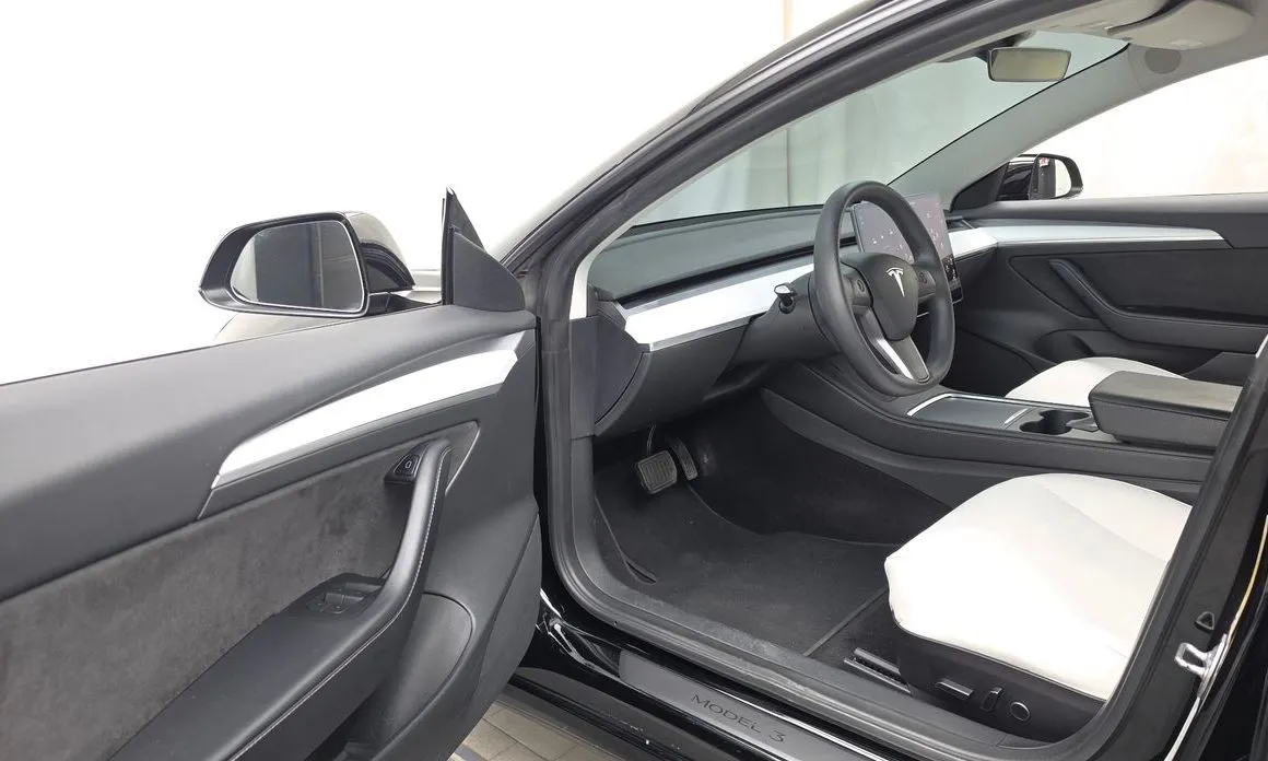 Tesla Model 3 — фото 10