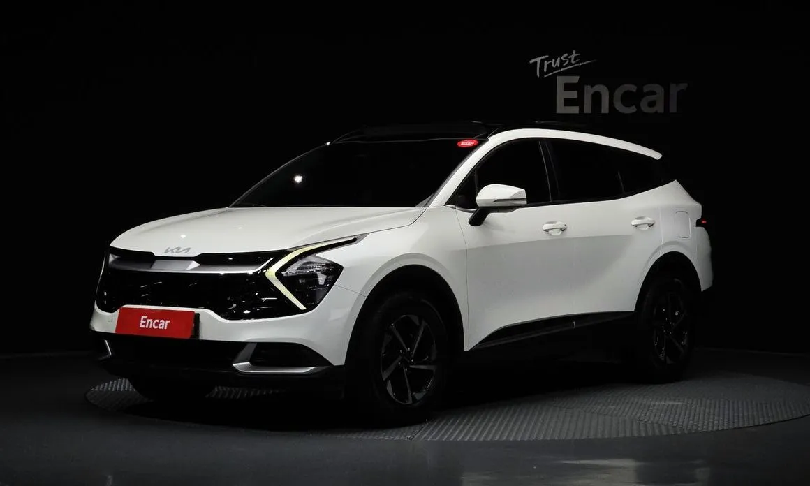 Kia Sportage — фото 1