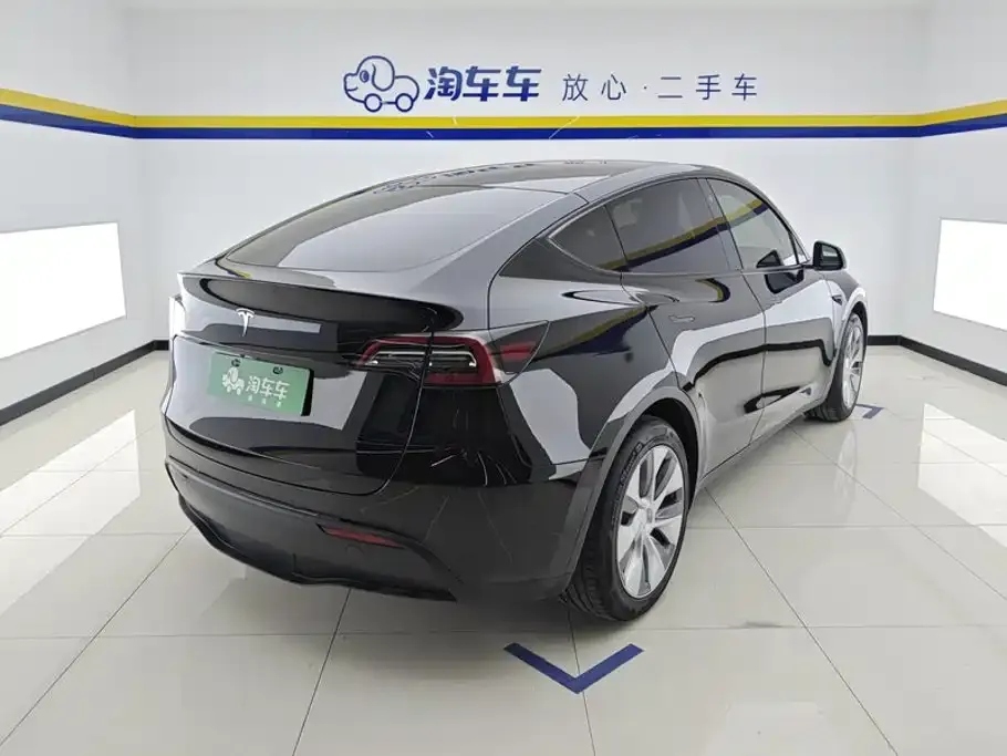 Tesla Model Y — фото 6